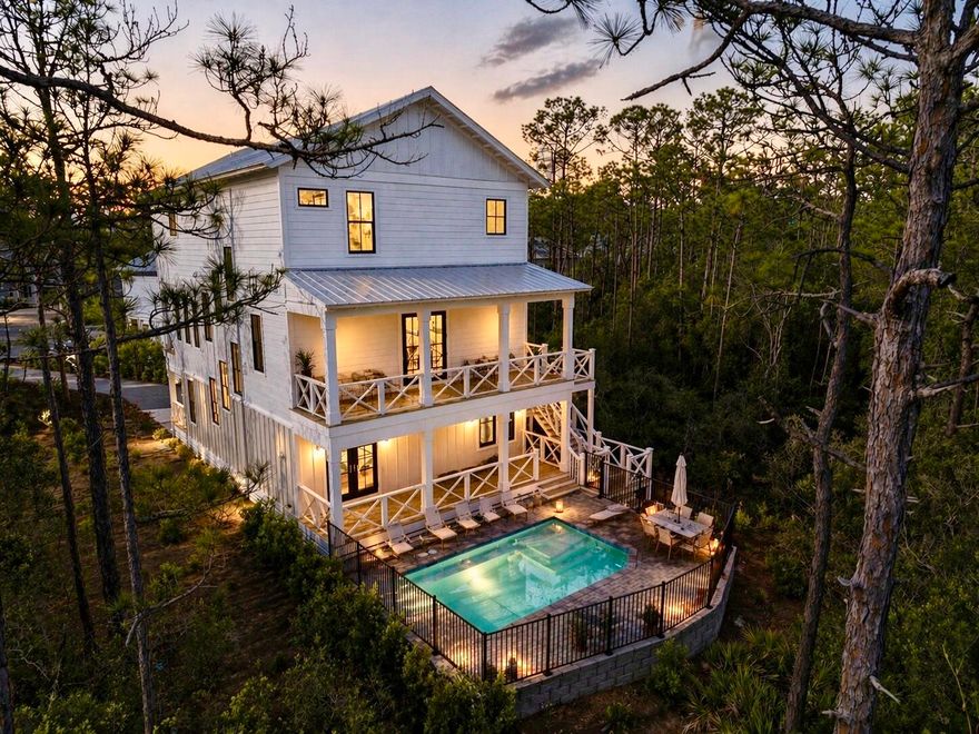 Brand new - 5 bedroom, 5.5 bath house in gated Treetops neighborhood adjacent to Seacrest with excellent rental projections ($125,,000+) and deeded beach access just half a mile away. (Beach shuttle picks up at the house) Enjoy a coastal chic, open concept design perfect for entertaining. The main floor (second floor) includes the living room, dining room, kitchen and laundry room. The first floor includes a two-car garage, entry way and two guest suites with private bathrooms. The third floor includes the spacious master suite with a luxurious master bathroom and a huge closet. The third floor also hosts two additional guest suites with private bathrooms. Treetops offers direct access to both 30A and Hwy 98 with easy access to Rosemary, Seacrest and Alys Beach.