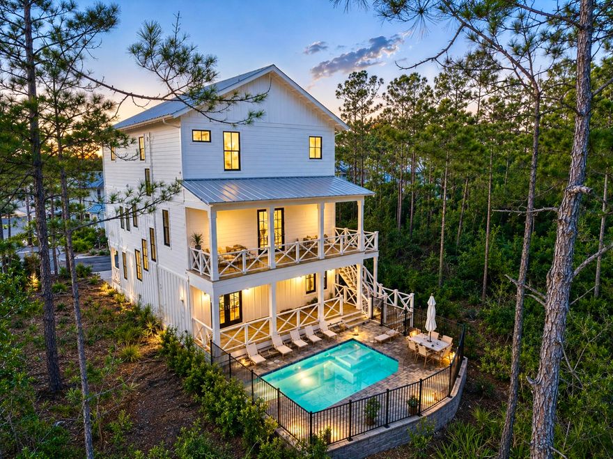 Brand new - 5 bedroom, 5.5 bath house in gated Treetops neighborhood adjacent to Seacrest with excellent rental projections ($125,,000+) and deeded beach access just half a mile away. (Beach shuttle picks up at the house) Enjoy a coastal chic, open concept design perfect for entertaining. The main floor (second floor) includes the living room, dining room, kitchen and laundry room. The first floor includes a two-car garage, entry way and two guest suites with private bathrooms. The third floor includes the spacious master suite with a luxurious master bathroom and a huge closet. The third floor also hosts two additional guest suites with private bathrooms. Treetops offers direct access to both 30A and Hwy 98 with easy access to Rosemary, Seacrest and Alys Beach.