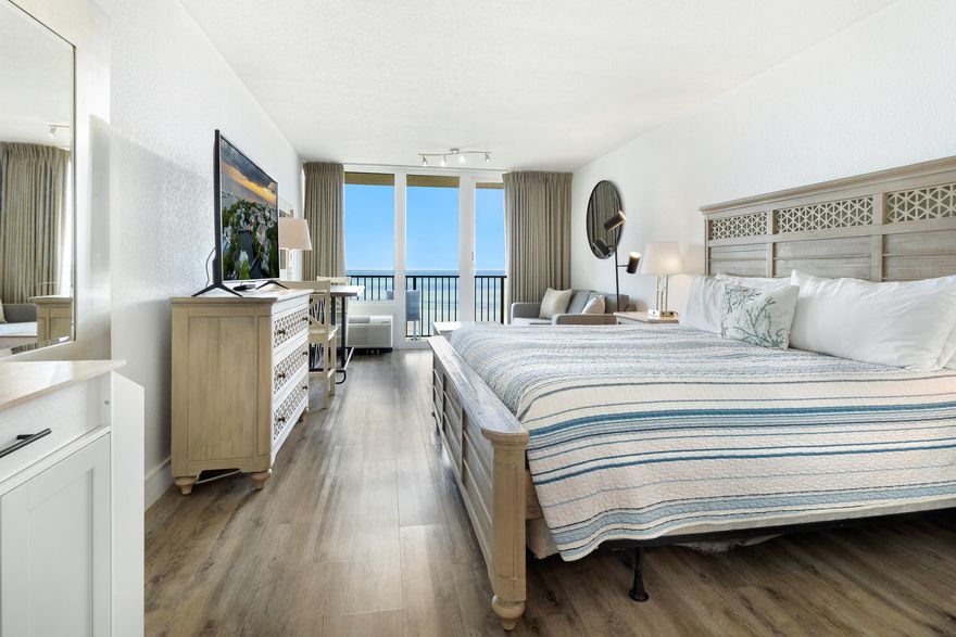 Wake up to sweeping 7th floor bay views and sunsets that seem to go on forever from this beautifully updated BAY FRONT studio! Enjoy a front-row seat to fireworks over the marina, or relax and take in the tranquil water vistas from your private balcony. Recent updates include luxury vinyl plank flooring, white granite countertops, white cabinetry, and stainless steel appliances including an undermount microwave and mini fridge/freezer combo. Offered fully furnished with a king bed, sleeper sofa, and convenient kitchenette, this studio is move-in or rental ready. Ideally located near the Links Golf Course, Conference Center, and Fitness Center, with easy tram access to the beach and Baytowne Wharf. HOA dues include all utilities, with only contents insurance required. As an introduction to the Sandestin lifestyle, we invite our new owners to explore amenities that make Sandestin special. The listing brokerage and seller(s) are presenting the buyer(s) of this property with (2) 90-minute rounds of Tennis court time, a golf foursome at one of our three championship courses, and a round of golf for up to four (4) players at the unrivaled Burnt Pine Golf Club.
Sandestin Golf and Beach Resort features more than seven miles of beaches and pristine bay front, four championship golf courses, 15 world-class tennis courts, a 226-slip marina, a fitness center, spa and celebrity chef dining. Shop, dine and play at the charming pedestrian village, The Village of Baytowne Wharf and more. Inside the gates of the resort, residents enjoy a balanced lifestyle of high-class living, spanning the 2,400 acres from the beach to the bay. Everything within the gates of the resort is accessible by golf cart or bicycle. The entire resort is interconnected by miles of pedestrian, bike and golf cart paths that weave through groves of live oaks, meandering past natural lagoons, fountains, man-made lakes, and meticulously landscaped fairways.