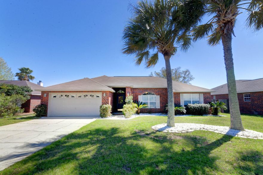 Great home at a great price in Villa Danielle with access to the Community Dock on the Pensacola Bay. Offering 2 living spaces, including a Wood Burning Fireplace. Brand new Stainless Steel Appliances and plenty of cabinet storage in the Kitchen. Also featuring Crown Molding, wiring for Surround Sound already in place and new landscaping rock to compliment the lush tropical plants and palm trees. This home is Freshly painted and move in ready! Call for your personal tour today.