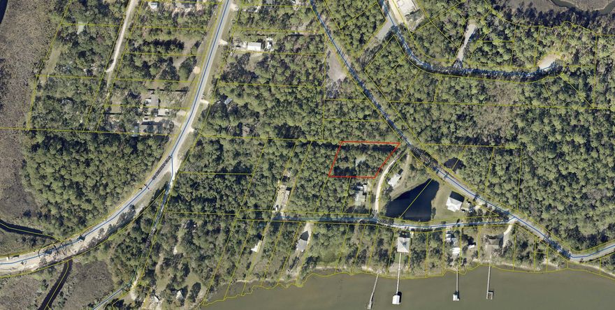 Two lots located close to everything Freeport has to offer. Great Opportunity to build your dream home on a large lot or build two houses. There is an old Mobile home on the property but no value has been added.