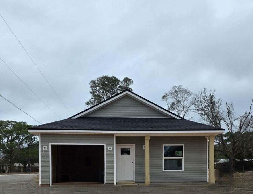 PRESALE. Need numerous properties for your portfolio? We have numerous new builds in area and coming. A new construction home featuring 3 bedrooms, 2 baths, and a 1-car garage, ideally located just minutes from the Navy base, shopping, dining, and entertainment. This thoughtfully planned home offers a spacious primary suite with an elegant tray ceiling, plus a spa-like bath complete with a double vanity and walk-in closet. The open-concept kitchen is a standout, showcasing a center island, Whirlpool stainless steel appliances, shaker-style soft-close cabinetry, and ample quartz countertop space--perfect for the home chef and effortless entertaining. Buyers have the rare opportunity to request select spec changes up to two weeks prior to construction start. Additional features include  non-impact windows with fabric hurricane protection and placement in an X flood zone means NO flood insurance required. Secure this home early and personalize your new construction before it begins!