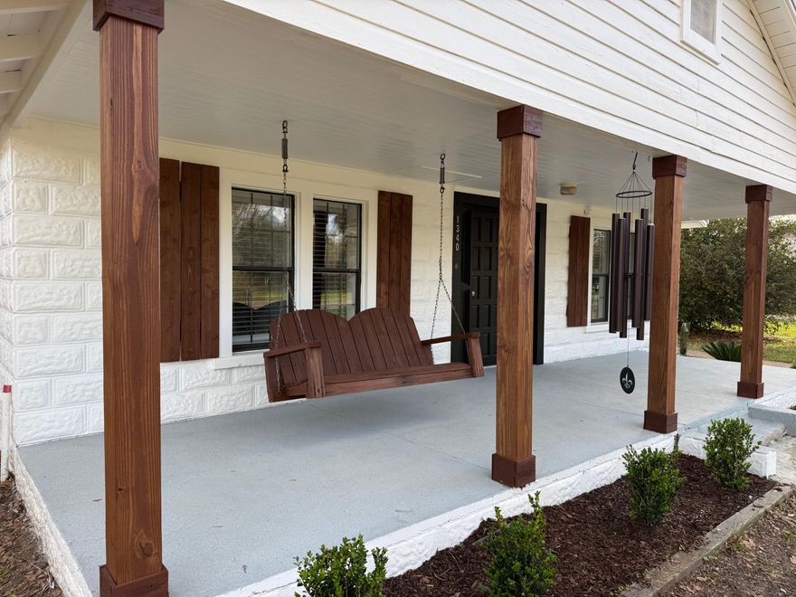 Don't let the 1949 on the tax record fool you -- 1340 Georgia Ave has been thoughtfully rebuilt from the inside out and is truly move-in ready. From the moment you arrive, you'll notice the charm of the freshly redone front porch, complete with wooden columns and a porch swing just waiting for slow mornings and quiet evenings.

Inside, this home has been lovingly brought back to life with new flooring throughout, a fully remodeled kitchen, updated bathrooms, and fresh paint inside and out. The kitchen feels clean, bright, and functional, offering a welcoming space to cook and gather. The home features 3 comfortable bedrooms, 1.5 updated baths, and plenty of flexible living space. A separate bonus room can easily serve as a guest room, home office, hobby space, or additional storage--whatever fits your lifestyle. The enclosed sunroom adds even more versatility and could become your morning coffee spot, reading nook, playroom, or creative studio.

Step outside and you'll find a fully fenced yard on a spacious 0.31-acre lot, giving you room for pets, gardening, or simply enjoying your own private outdoor retreat. The metal roof adds durability and long-term peace of mind, while the refreshed landscaping and charming porch create curb appeal that makes people slow down when they pass by.

Located in the heart of Baker, Florida, this home is just a couple of blocks from Baker School (PK-12), the Baker Block Museum, and the local grocery store. When you need more shopping, dining, or services, Crestview is only about 15-20 minutes away.

With no HOA, no extra fees, and no restrictions, you have the freedom to truly make this property your own.

Move-in ready. Renovated top to bottom. Homes with this much character at this price point don't stay on the market long -- schedule your showing today.