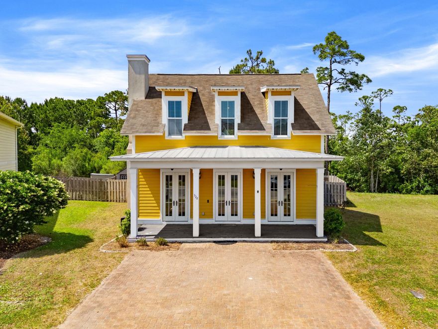 There is a certain ease to life when the beach is just a short walk away, when mornings begin with salt air and evenings settle into a quieter rhythm. This four-bedroom residence in Harrison Walk offers that balance, pairing everyday comfort with a location that keeps the best of Panama City Beach within easy reach.

Inside, the home unfolds across approximately 2,300 square feet with a layout designed for both gathering and retreat. Ten-foot ceilings elevate the main living spaces, where natural light moves easily through an open-concept design. The first-floor primary suite introduces a sense of privacy and convenience, while three additional bedrooms upstairs provide flexibility for guests, family or a dedicated workspace. Recent updates, including fresh interior paint and new carpet in all bedrooms, create a clean and welcoming backdrop. Finishes throughout feel thoughtfully selected, offering a step above what is often found at this price point and leaving room for a buyer's personal vision to take shape.

Curb appeal sets the tone on arrival, with a covered front porch and brick paver driveway creating a polished first impression. Beyond the home, a community pool adds a relaxed gathering space, while the absence of short-term rentals preserves a more residential atmosphere.

Positioned within walking or biking distance to the beach, the pier and nearby attractions like Shipwreck Island Water Park, this property offers both accessibility and a sense of calm. Priced with intention, it presents a compelling opportunity for a primary residence or second home in a location that continues to draw lasting interest.