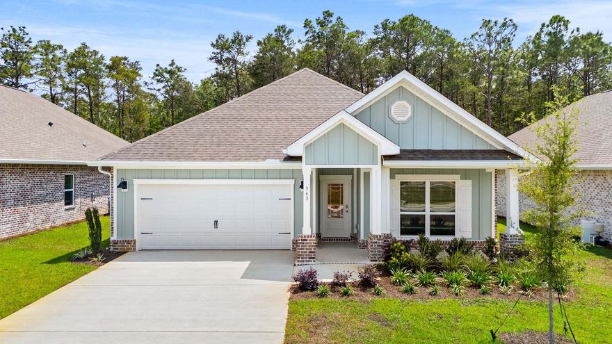 Welcome to 343 Holley Grove Lane, a new home at Holley Grove at Peach Creek in Santa Rosa Beach, Florida. This home is ready for move in and has a warm entry hall that leads into a generously sized living area, where natural light creates an inviting atmosphere. The heart of the home, an expansive kitchen, has a practical center island with quartz countertops, perfect for meal prep and space for bar seating. It has white upper and lower cabinetry throughout and a large corner pantry where storage will never be a concern. Entertaining is a breeze with the kitchen's seamless flow into the living and dining areas with EVP flooring throughout. The kitchen has a stainless-steel appliance including a smooth top stove, microwave and dishwasher. The primary bedroom, a sanctuary of privacy, features EVP flooring and a spacious ensuite bath complete with a dual sink vanity, separate shower, and indulgent soak tub, alongside an ample closet space. The home's three additional bedrooms, each with substantial closets, share a full bathroom equipped with a shower-tub combo. A large laundry room off the entry hall adds to the home's practicality. Additionally, the two-car garage provides ample space for vehicles and storage. Outside, the covered entry and back patio offer the perfect backdrop for alfresco relaxation or dining under the Florida sky.