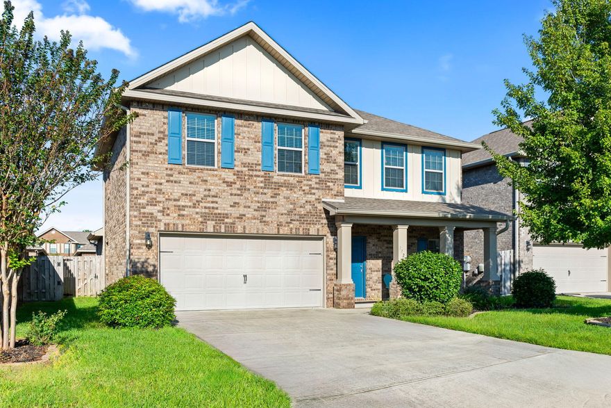 Perfect for multi-generational living! Immaculate, well maintained stunning 5-Bedroom, 2.5 Bath Home with Luxurious Features! Come home to this gorgeous 2-story home, boasting large spacious bedrooms and updated 2.5 baths. The lower level features elegant 18'' tile flooring throughout and a convenient half bath near the entryway. The neutral color palette provides a perfect backdrop for your personal touch. The kitchen is a chef's dream with granite countertops, stainless steel appliances, a coffee bar area, a large island with a sink, and beautiful cavalier espresso cabinets. The expansive pantry and breakfast bar offer ample space for storage and casual dining. Additional storage is available in the laundry room, complete with extra closet space with shelves. The master suite, located on located on the lower level, includes a  luxurious master bath with a tiled shower extending from ceiling to floor, a garden tub, and high-level double vanities. French doors look, leads to the outside patio, creating an inviting space for outdoor entertainment and relaxation with a fenced backyard. Upstairs, you'll find a large additional living/den area, perfect for a game room or secondary family space. Could be dedicated office and guest space! Two beautiful Archways lead to four Additional bedrooms, each equipped with walk-in closets and AC vents for added comfort. The upstairs full bath features double vanities for convenience, granite high level countertops, and tub/shower combination; This home also includes practical features such as gutters and more. Don't miss out on the opportunity to make this beautiful house your new home! Call for your private showing today!