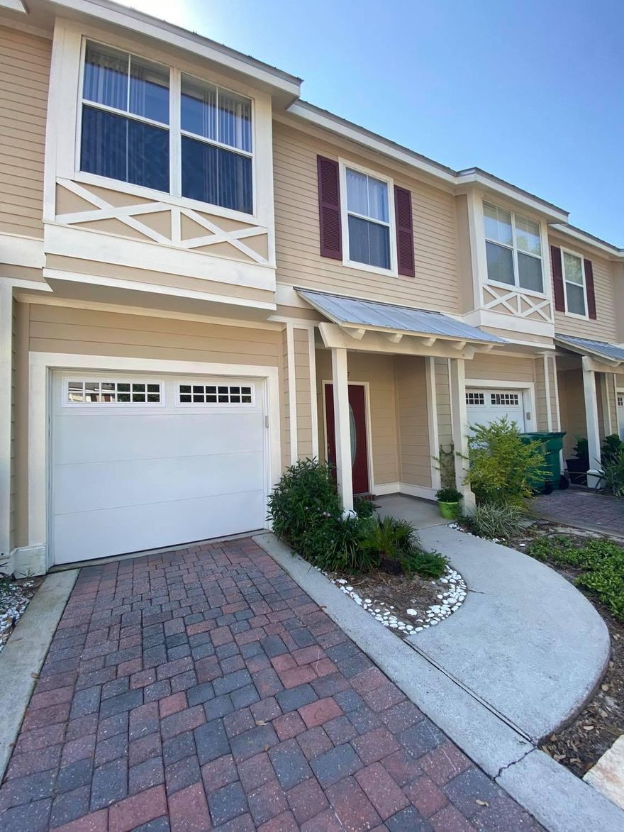 MOVE IN SPECIAL - $500 off first month's rent if you move in by April 1! Charming Old Florida-style 3BR/2.5BA townhome in the heart of Destin. Enjoy a 10x16 covered porch overlooking the lake. The first floor features 9-ft ceilings, a half bath, and a kitchen with stainless steel appliances, granite countertops, pantry, breakfast bar, and crown molding in the spacious living/dining area. The primary suite includes a walk-in closet, double vanities, garden tub, and separate shower. Two additional bedrooms share a full bath. Laundry closet with washer/dryer (as-is) and one-car garage included. Access to Twin Lakes playground. Close to beaches, dining, shopping, and parks. Resident Benefits Package $50/month (renters insurance, HVAC filters, credit reporting). No smoking. Credit and deposit