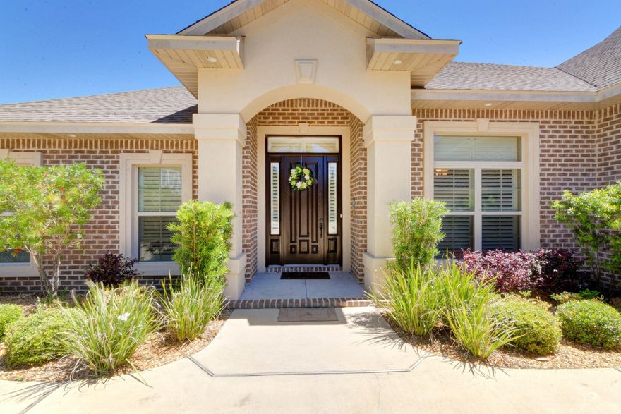 WELCOME HOME to Florida living at its best/This beautiful custom built 5 bed 4 bath home is located in the prestigious water front lifestyle of Heritage Park .A private GATED community located on the Santa Rosa Sound. Homeowners enjoy vintage light cobbled entry, curbed sidewalks, ornate mailboxes, underground utilities and a WATERFRONT clubhouse featuring an in ground pool/designed to enjoy the best views over the Santa Rosa Sound, workout room, conference area, lounge with TV and a fully fitted kitchen/all with breathtaking views of Santa Rosa Island from its elevated location. Enjoy the common green area with deeded access to the beach and Santa Rosa Sound/ Perfect to walk and watch the beautiful sunsets or just sit on the seawall and feel that wonderful Gulf Breeze. You're 3277 sq. ft. home boasts mature lush landscaped front & fully fenced back garden with covered porch to cook out and enjoy those wonderful Florida evenings. This custom built home is fully tiled in all wet areas and gorgeous wood flooring throughout the hallways and main living area, high ceilings/double crown molding, open flow into the formal great room with 14"double trey, detail mantel fireplace, and providing access to the covered porch. Spacious gourmet kitchen/ granite countertops /large walk in corner custom shelved pantry, custom stainless steel appliances including a great gourmet style huge side by side fridge, freezer/ built in microwave/ convection oven, formal dining room with wood flooring and sweeping archways/ breakfast area, open flow to the family room with high ceilings, focal point gas fireplace, providing a perfect family area to relax and entertain. Huge Master bedroom suite with high tray ceiling/sitting area for your enjoyment. Luxurious master bathroom / oversized sunken jetted tub/ separate walk in seamless glass shower which is fully tiled, Master suite bathroom has plenty of dressing area ,granite double vanity / deep walk in closet with his and her split & custom shelving/ partitioned WC .This split floor plan home has good sized additional bedrooms with the 2nd & 3rd bedroom enjoying a Jack and Jill bathroom and the 4th bedroom/guest area with its own full bathroom .The 5th bedroom /Bonus room is huge and has a full walk in bathroom, all with high ceilings and ceiling fans. You will appreciate the attention to detail throughout this custom built home  with soaring ceilings,crown molding ,trey ceilings ,plantation shutters to name a few and also has Fabric Shield Hurricane shutters and does not require Flood Insurance. Heritage Park is one of the most prestigious locations in the Navarre area and is within easy driving distance to Hurlburt field AFB