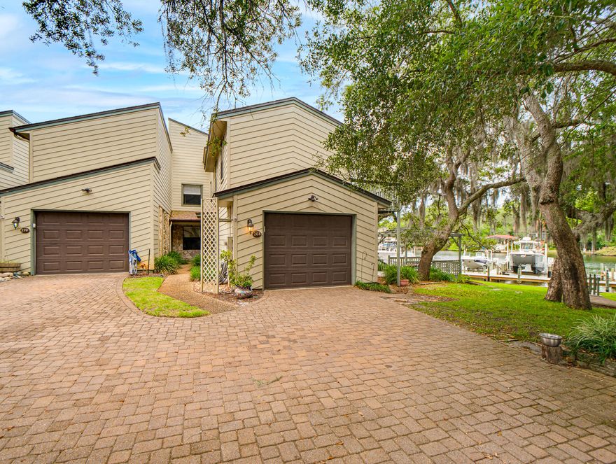 Welcome to 268 Kidd St -- a stunning new listing nestled within the exclusive Kidd Bayou Oaks community in Fort Walton Beach. This spacious 4-bedroom, 2.5-bathroom townhouse offers 2,106 square feet of thoughtfully designed living space, where elegant bamboo and travertine flooring create a seamless flow throughout. Perfectly positioned along 340 feet of pristine Cinco Bayou waterfront. 

Head outside and discover your own private community dock where mornings begin with paddleboarding, kayaking, or jet skiing across the clear, protected waters. Fishing enthusiasts will love casting a line right from their backyard, while the nearby beaches offer endless coastal adventures just minutes away.

Inside, this home delivers room and comfort, with generous living areas bathed in natural light and a private balcony ideal for soaking in breathtaking bayou views. Towering pine and oak trees frame the landscape, creating a serene natural canopy that feels worlds away from the everyday hustle.

The community offers inviting shared spaces, including a gathering firepit perfect for evening conversations under the stars. Francis Park is located nearby for additional outdoor recreation, and convenient public transit access is available at nearby Uptown Station.

Conveniently located near both Eglin Air Force Base and Hurlburt Field, making daily commutes a breeze. Pets are welcome, and dedicated parking ensures everyday convenience. At this exceptional price point, waterfront living with a private community dock rarely comes available. Schedule your showing today before this opportunity slips away.