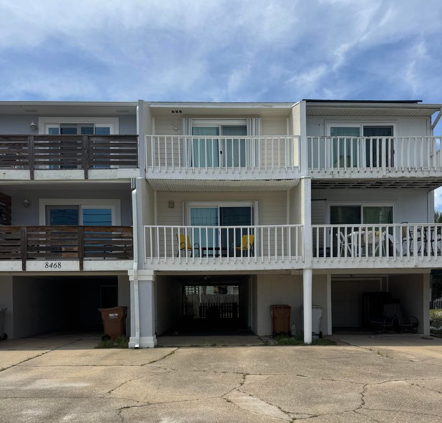 NEW EXTERIOR PAINT! Seller will consider any responsible offers!! Gorgeous GULF VIEWS from your balconies on Navarre Beach make this the perfect place to relax and enjoy the coastal scenery. Known for its pristine white sands and sparkling emerald waters, Navarre Beach is a beloved destination for beach lovers. This beautifully updated three-story townhouse features brand new LVP flooring throughout, stunning new quartz countertops, and a completely repainted interior. Several expansive balconies provide plenty of space to enjoy the fresh sea breeze and the sights and sounds of the Gulf of Mexico. The main living areas are located on the second floor, with balconies off both the living room and kitchen, plus a full bathroom for guests. The third floor is home to both bedrooms and the master bath, offering comfort, privacy, and breathtaking views. Each bedroom has its own private balcony, with the master bedroom balcony facing the beautiful Gulf of Mexico. Whether you're looking for a vacation rental or a permanent residence, this townhouse with direct Gulf views on Navarre Beach offers the ideal setting for relaxation and coastal living.

**Home comes fully furnished**