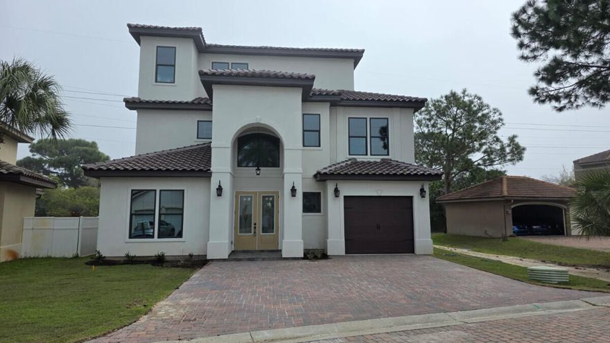 3-Story one of a kind LUXURY home move-in ready! The is the best house in Calusa Bay, come see for yourself. Open plan with 10-foot ceilings, crown molding in common areas, Granite/Quartz countertops and Backsplash, Vented Fireplace in Family Room, Tile Floor in 1st Floor, Hardwood Floors in 2nd and 3rd Floor, ceiling fans in every room. Thor Range, Thor Dishwasher, Thor Wine Cooler, ZLine cabinet Microwave, Dual Fisher Paykel Refrigerator, pot filler, Island is 4'x10' with large Sink. Walk-In Pantry in Kitchen. Foyer entrance has beautiful curved staircase with a modern chandelier. Powder in 1st Floor. Laundry Room in 2nd floor with sink. 2nd Floor has 3 Bedrooms and 2 Full Bathrooms (2 Bedrooms share a bathroom). Large Loft Space with Balcony by staircase in 2nd Floor. Third Floor Master Bedroom with custom mdf Walk-In Closet. Master Bath has double vanity with vessel sinks, Stand Alone Tub, and Large Shower. Covered Patio with custom cabinets, built-in natural gas Grill, granite countertops, and bar sink. 1-car garage with insulated door and belt drive motor. The paver driveway can fit four additional vehicles. Short Term Rentals are NOT allowed per HOA.