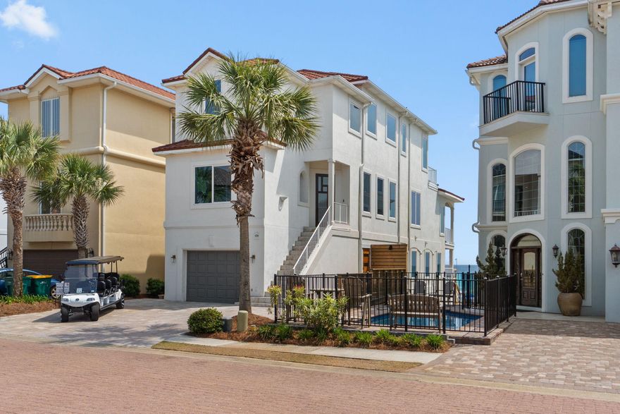 Extensively rebuilt and reimagined in 2025, this like-new Gulf-front estate offers unobstructed views, direct beach access, and refined modern coastal living. Ideally perched on the gulf front dunes within the exclusive, gated community of Destiny by the Sea, 4736 Ocean Blvd is a secluded retreat removed from the crowds. The open-concept primary living area seamlessly connects the kitchen, dining, and living spaces to a large second-floor balcony, showcasing sweeping Gulf views along Destin's eastern coastline. All five king suites are thoughtfully designed and furnished, each with freshly remodeled en-suite baths. The layout comfortably accommodates larger groups and is complemented by a private beachfront pool, in-home elevator, garage, and an 8-seat street-legal low-speed vehicle. The private beachfront heated pool features integrated spa jets and bench seating overlooking the Gulf, ideal for unwinding before, after, or instead of time on the sand. A private dune walkover provides effortless beach access with no roads to cross, creating a seamless connection to the shoreline. The indoor and outdoor comforts of this home are suited for quiet mornings or vibrant evenings spent entertaining against the backdrop of the Gulf.

4736 Ocean Blvd represents a compelling blend of lifestyle and long-term investment in a location that continues to outperform the broader market. Whether held as a private coastal estate or leveraged as a high-performing asset, this beachfront home is defined by luxury, quality, and enduring value.

Highlights:
- Gulf-front with unobstructed, panoramic coastline views
- Extensively rebuilt and reimagined in 2025, offering like-new condition
- Located in Destiny by the Sea, one of Destin's most exclusive gated communities
- Five king suites, each with a beautifully renovated en-suite bath
- Private beachfront heated pool with integrated spa jets
- Direct dune walkover for effortless beach access with no roads to cross
- Expansive second-floor balcony outdoor living space with sweeping Gulf views
- In-home elevator and garage
- Includes 8-seat street-legal low speed vehicle ("golf cart")
- Offered fully furnished and turnkey