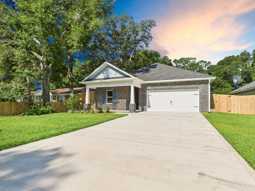 Move into this stunning 5-bedroom, 3-bathroom new construction home with 2,318 sq. ft. of thoughtfully designed living space. Perfect for multi-generational living, this home blends modern comfort with timeless charm. The upgraded kitchen showcases quartz countertops, a tile backsplash, soft-close shaker cabinetry, pendant lighting over the island, and sleek stainless steel appliances. Luxury vinyl plank flooring flows throughout, including the bedrooms. This home is filled with custom features you won't typically find in other new construction homes: 
* Designer lighting in the dining area and bathrooms
* Crown molding and cased windows for a polished finish
* Upgraded mirrors and fixtures in bathrooms
* Ceiling fans already installed
* Built-in drop zone for everyday convenience
 * Laundry room cabinets for extra storage
Tray ceilings, natural gas service (heat, cooking range, dryer hookup, and tankless water heater), and carefully chosen finishes elevate the appeal even further. Builder will pay doc stamps, title fees, and the final survey.