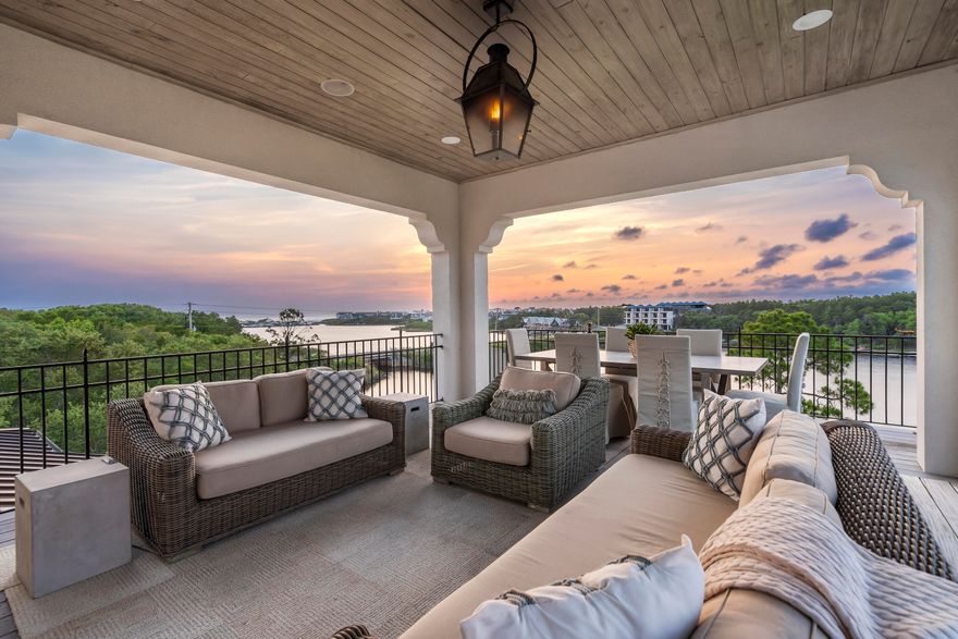 Find SOLITUDE and SERENITY at 63 South Camp Creek Road. Enjoy lakefront living minutes from the stunning white sand beaches of the Gulf of Mexico. Situated prominently on the shores of Camp Creek Lake, this luxury residence was completely renovated and extensively added onto in 2019 as the personal home of a prominent local builder.  Masterfully constructed, it features 4 massive primary bedrooms with en-suite baths and walk-in closets, 2 additional guest bedrooms, an office, large kitchen and wine room, 3 separate laundry areas, and an elevator servicing all floors of the home to include the rooftop terrace. This Mediterranean style home sits on a lushly wooded estate-sized lot with 73' fronting one of the few rare coastal dune lakes in South Walton and offers iconic views of the Gulf.