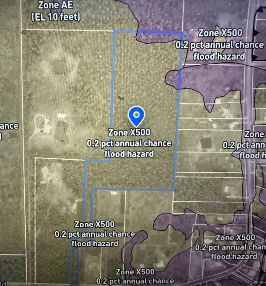 Discover the blend of privacy and convenience with this stunning 20.52 acre Rural Residential Single Family(RR1) parcel. Nestled in a peaceful setting, this property offers endless possibilities--whether you're looking to build a future home, have a weekend getaway, or have land to play on. This parcel is located close to 1-10 and Avalon Blvd, providing a short drive to the interstate and quick access to beautiful beaches, shopping, dining, and everyday conveniences. This property has deer if you are a lover of the Florida wildlife. It's also not far from Pensacola Bay, where there happens to be mallards, dolphins, and red fish. On this property, there is also plenty of room to roam around on your atv or side-by-side.