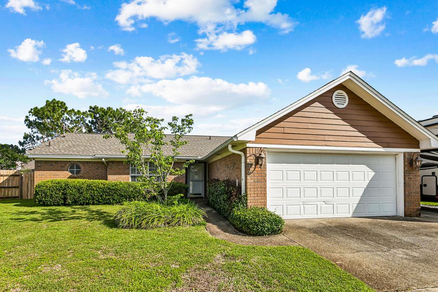 This well-designed home showcases approximately 1,385 square feet of living space with three bedrooms and two bathrooms. The property features paid-off solar panels and geothermal heating and cooling systems, providing eco-friendly and energy-efficient living. The large backyard offers ample space for outdoor enjoyment, while the enclosed porch provides a cozy and protected area for relaxation. The interior of the home is well-maintained and features a dedicated dining area, as well as a split bedroom layout for added privacy. The property has additional space for boat or RV parking and is situated in a cul-de-sac, ensuring a quiet and private setting.