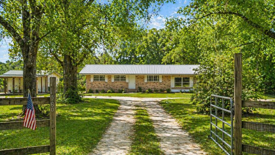 2.55 acres, pasture views, and a back patio made for slow mornings. This is the kind of space buyers are struggling to find in Walton County right now. If you've been searching for acreage in Walton County with usable land, pasture views, and real lifestyle flexibility. This is the one that checks the boxes. Set on 2.55 acres in north Walton County, this DeFuniak Springs property offers the kind of space that's no longer easy to come by, paired with everyday convenience and access to everything that makes this area special.

From the moment you step inside, your eye is pulled straight through the home to the back, where glass doors off the kitchen open to a patio overlooking open pasture. This is where life happens. Morning coffee with quiet views. Evenings watching the sky change colors. Weekend gatherings that naturally flow from indoors to out. It's not just a backyard...it's a setting that creates a feeling.

The land is where the opportunity really expands. With 2.55 acres, buyers have the flexibility for gardening, outdoor living, recreation, storage, or workspace. A detached outbuilding/workshop and covered parking add real, functional value, ideal for tools, equipment, hobbies, or simply having room to operate without compromise.

Location is what makes this property stand out even more. Just minutes from the heart of DeFuniak Springs, you'll find the charm of historic downtown anchored by Lake DeFuniak and Chipley Park, known for its rare spring-fed circular lake, walking paths, and year-round community events. Nearby Morrison Springs offers one of the most recognizable freshwater spring experiences in the Florida Panhandle, perfect for swimming, paddleboarding, and outdoor exploration.

For buyers wanting both space and accessibility, this location delivers. Easy access to Interstate 10 (Exit 85) and U.S. Route 331 provides a direct route south to the beaches of South Walton, giving you the ability to enjoy white sand, coastal dining, and 30A lifestyle while still coming home to privacy and land.

Walton County also continues to attract buyers for its strong public school system, with Walton County School District consistently recognized as one of the top-performing districts in the state, adding long-term value and appeal to this location.

This is more than just a home! It's a chance to own land, create your lifestyle, and stay connected to everything that matters: community, town, water, nature, and the coast.

Opportunities like this are getting harder to find in today's market. Schedule your private showing today and experience the space, setting, and potential for yourself.