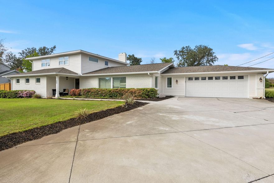 Welcome to an incredible opportunity to own a home in the heart of the Cove neighborhood, across from the Bay on a corner homesite! With NO HOA, this home is a rare find in the Cove and features a gorgeous saltwater-heated pool/spa, 2-car garage and over 3,000 square feet of living space. With 4 bedrooms, 3 full bathrooms and 2 half baths, this fully-renovated home offers ample storage, large closets, oversized bathrooms and high-end features throughout. Best part - it's on one of the most desirable streets in the historic Cove neighborhood! Step into the entryway and you're greeted by an open concept with consistent flooring throughout, a large kitchen island, a brick-clad fireplace and large windows flooding the great room with natural light. This home was designed for entertaining! The expansive kitchen features an abundance of custom kitchen cabinets, granite countertops, Kitchen Aid and Frigidaire Professional appliances, a full-size walk-in pantry, wine refrigerator and a large kitchen island open to the living room and dining room. The living room with a brick fireplace features double French doors that lead to a covered patio and a stunning saltwater-heated pool and spa. The oversized great room has an accessible powder room for guests and also allows for a sitting room, additional family room and is open to the dining room, just off of the kitchen. The main level offers a primary suite with French doors leading to the patio, a large walk-in closet with custom built-ins and a spacious en suite bath. The en suite bath has a walk-in tiled shower, separate soaking tub and double vanities with quartz countertops. The upper level offers 3 additional bedrooms, two full baths and a half bath. This is an incredible option for guests or family members who share a bathroom with 3 vanities available on the same level! One bedroom has an ensuite full bath and a large walk-in closet with built-ins. Two guest bedrooms share a full bath and powder room accessible by the hallway. Consistent flooring throughout the upper level creates a great flow for the home. The bedrooms upstairs also offer great views of the Bay! The backyard is a true oasis! The covered porch is great for entertaining...imagine cooking s'mores and watching the kids play in the pool year-round. With a heated pool and spa, you will enjoy this great amenity with your friends, family and neighbors all year long! The corner homesites allows a large yard with lush landscaping and sod. A unique feature of this home is also a climate controlled storage room over 200 SF, accessible by the back yard. This gives the option to store items or also expand the primary bedroom walk-in closet for additional space or a larger laundry room. Possibilities are endless! With a full interior renovation in 2021 and a full exterior renovation in 2022, this Cove home has been completed remastered! 200 Hollis Avenue has a beautiful white brick exterior, a unique and super functional drive-through 2-car garage and a luxurious pool. Extensive landscaping has been added to the home and a lovely addition of mature oak trees that complement the Cove neighborhood. There is a shallow well, an irrigation system with 4 zones and newer pool equipment. The Cove is a well-established neighborhood covered with hundred year oak trees and lovely neighborhood parks. With no HOA, this is a great place for those who wish to have all the toys, for kids and adults alike. This is a great opportunity to live in the Cove!