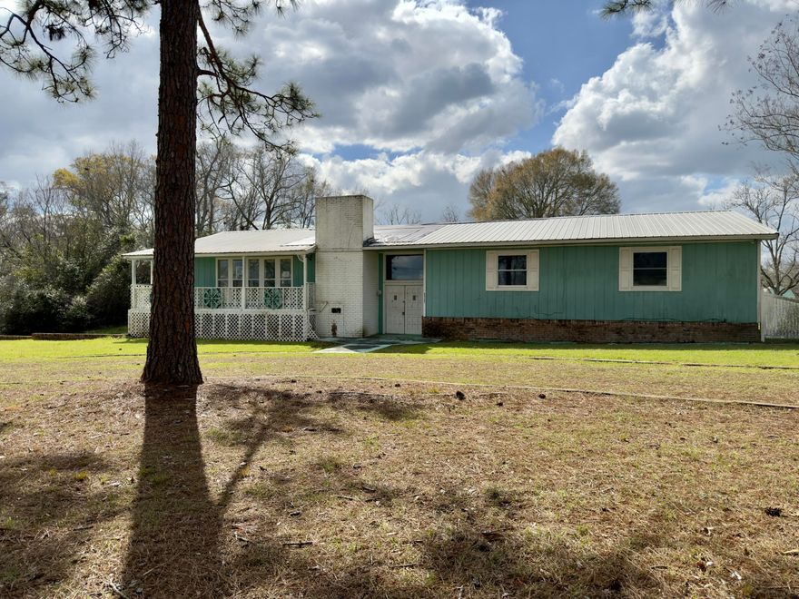 If looking for a home that is just minutes from the AL/FL border, comes with some acreage, has a huge floor plan and comes with LOTS of potential, then this REO opportunity may just be what you were looking for! This home was built in 1978 and has a finished basement with laundry, full bath, living space, bedroom, extra storage, and access to the oversized 2 car garage. Upstairs, which is entry level, you will find the large living room with fireplace, large kitchen with island, tons of cabinets, and a spacious pantry. The remaining bedrooms, including the primary bedroom and over sized master bath, both have views of the pool area. This home's second floor and lots of windows and natural light, adding to that 'open' feel. The pool area is fenced and though covered, is holding water.  The home will not qualify for most financing, therefore it is recommended to be prepared for a renovation loan (Conventional, VA, or FHA) or cash when looking to make an offer. Call today!