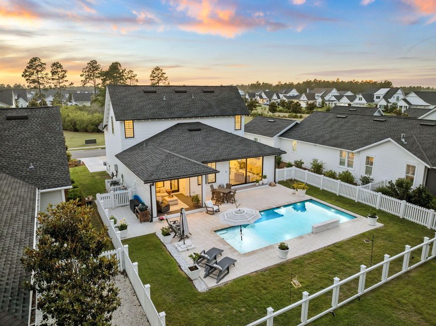 Set on a deep 133-foot lot with a private wooded preserve behind the home and a community green space directly across the street, this 2020 Huff Home offers something increasingly hard to find in Watersound Origins: no rear neighbors, and an open outlook in front instead of another roofline staring back at you. 

This Draper II plan opens through a wide sliding door in the main living area that frames the pool and preserve beyond. Outside, a 14x27 pool with a sun shelf anchors an expansive paver patio, set behind a privacy fence with mature pines rising past the back line. A screened porch with motorized screens - accessed off the kitchen - extends the living space and makes daily outdoor use practical year-round.

One of the highlights of the home is the kitchen - open, light, and positioned to take advantage of the pool view through the rear sliders. Quartz island, Bosch stainless, gas range, and wood cabinetry give it the kind of finish you'd expect at this price point without feeling overdone. Luxury vinyl flooring runs throughout, and the closets are built out across the bedrooms.

The floor plan puts the primary suite on the main level, with three more bedrooms and a second living space upstairs - a layout that works equally well for full-time families and for hosting guests. At 2,220 square feet, the home includes 4 bedrooms, 3.5 baths, and a 2-car garage.

Exterior details reflect the same attention throughout: heirloom brick, bronze windows, and rain gutters. Watersound Origins offers an unparalleled coastal lifestyle with access to a state-of-the-art fitness center, seasonally heated community pool, Lake Powell dock access with community kayaks and canoes, an executive golf course, tennis & pickleball courts, and miles of scenic trails. For the ultimate beach experience, owners can join the St. Joe Beach Club, unlocking private beach access, multiple pools, Gulf-front dining, and exclusive golf courses (Camp Creek, Watersound III & Shark's Tooth).

Ideally located just minutes from the new Publix town center, Scenic Highway 30A's top restaurants, boutiques, and year-round events, this one-of-a-kind property offers a rare opportunity for resort-style living in a prime location.