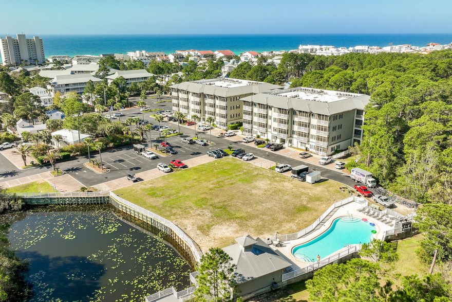 Tucked in the heart of Seagrove Beach along Scenic Highway 30A, this Seagrove Highlands retreat offers the kind of ease owners and guests are searching for. With the recently opened beach access nearby, getting your toes in the sand just got even easier.

Inside, soaring ceilings and an open layout create a bright, airy feel that lives larger than expected. Natural light pours through French doors and oversized windows, giving the living space a warm, inviting feel perfect for gathering after a day at the beach.

With three bedrooms, including a thoughtfully designed bunk room that comfortably accommodates extra guests, this condo is set up for both personal enjoyment and strong rental appeal. Whether hosting family, kids, or friends, there is room for everyone to spread out and enjoy the 30A lifestyle.

Step onto the private screened balcony for morning coffee, evening cocktails, or a quiet moment to unwind after a day on the beach.
 You'll absolutely fall in love with the open kitchen, where sleek modern white cabinets shimmer in harmony with stainless steel appliances. The center island, complete with cozy seating for two, is the perfect spot to enjoy a leisurely morning coffee or whip up delicious snacks for family and friends!

As you retreat to the luxurious primary suite, tranquility envelops you in this peaceful oasis. This stunning sanctuary boasts a lavish private bathroom equipped with a spacious walk-in shower, a double vanity, and a bathtub that invites you to soak away the stresses of the day. In addition to the primary suite, this unit also features two guest bedrooms and another bathroom. With coastal decor and LVP flooring throughout, you'll immediately sense the elegance and comfort in every corner.

And that's just the beginning! This unit comes fully furnished and rental-ready, complete with an awesome 6-seater golf cart to cruise around 30A in style! 

But wait, there's more! Dive into the array of fantastic amenities, including a clubhouse, a charming pier overlooking the lake, a refreshing swimming pool perfect for those sunny days, and walking trails that beckon you to explore the natural beauty that surrounds you. Ideal for those seeking an active lifestyle, you'll find yourself just moments away from not one, but two public beach accesses! 

All information is believed to be correct; buyer to verify all information in the MLS listing.