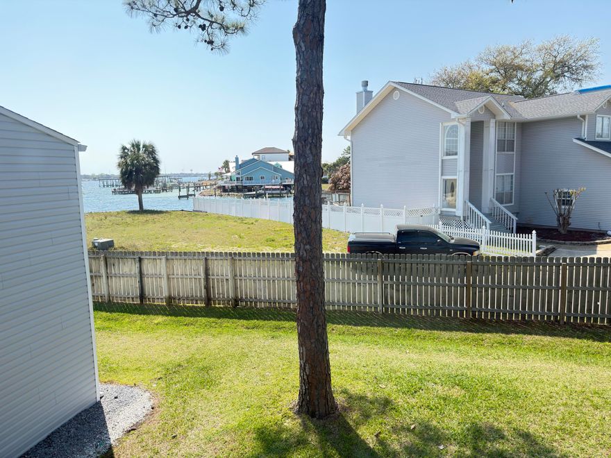 Located in the heart of Shalimar and with view of the bay from your living room window or balcony, this REO opportunity is waiting for you. A 2nd floor unit, this condo has 2 bedrooms and 1 full bath, lvp flooring throughout and resides in a gated community. No short rentals allowed at this property. One of the few waterfront communities in Shalimar. Perfect for long term rental investors (restrictions apply (post 2 year ownership)or 1st time buyers looking for nice entry point to own with security of lower maintenance costs, community amenities and gated security. A must see to appreciate. This home may qualify for Vendee™ seller financing but may not qualify for all traditional financing.