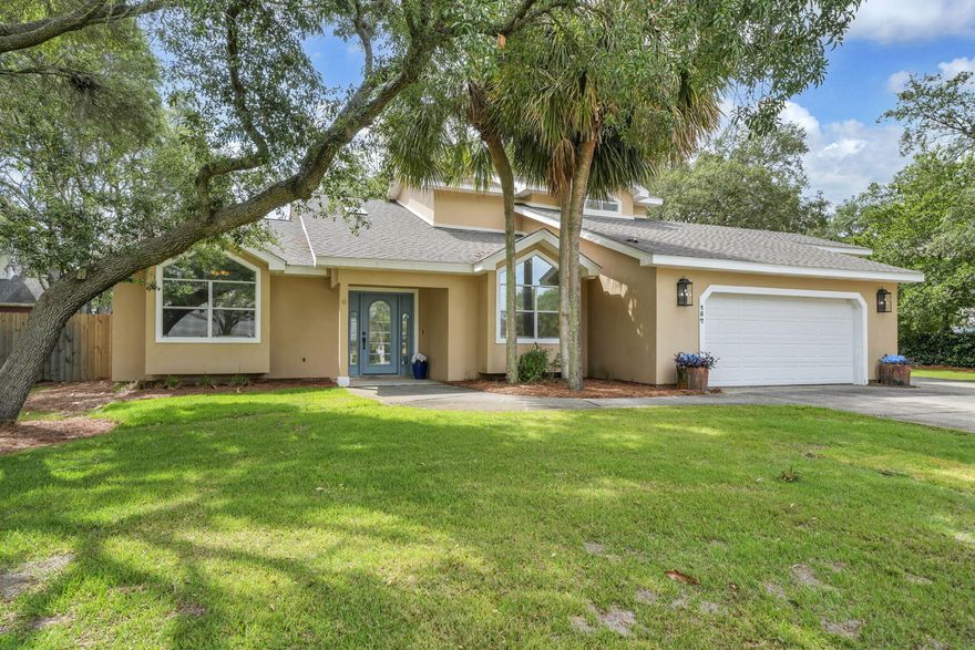 Welcome to one of the best values in Indian Bayou!  This updated home offers the rare combination of location, lifestyle & affordability in one of Destin's most desirable neighborhoods-- all situated on a sprawling 0.35-acre lot w/a spacious privacy-fenced backyard offering ample room for a pool. Enjoy plenty of space for vehicles, boats, or golf carts w/a 2-car garage & oversized vaulted carport. Ideally positioned across the street from the Bayou & just minutes from Indian Bayou's executive 18-hole golf courses, this location embraces the very best of the Destin lifestyle. Plus, you're only 3 miles from the stunning white sand beaches of the Gulf & Henderson Beach State Park. Recent updates welcome you to a fresh & inviting atmosphere, including a newly painted interior and new interior & exterior lights.  Beautiful travertine floors, crisp white walls, soaring vaulted ceilings & abundant natural light enhance the open-concept living spaces, while the cozy fireplace adds warmth & charm to the main living area. A large, updated kitchen w/granite counters, center island, SS appliances & octagon trayed ceiling flows into the spacious living & dining areas ideal for entertaining or everyday living.  Two BR's & a full bathroom are also on the 1st floor.  Upstairs, the private primary suite serves as a relaxing retreat w/cathedral ceilings, large glass French doors opening to the new balcony, spacious walk-in closet,  (READ MORE) and en suite bathroom w/dual vanities, granite countertops, ample storage & walk-in shower. Spend your mornings sipping coffee and enjoying the peaceful natural surroundings from the spacious exterior balcony off the primary suite. An additional upstairs loft offers approximately 107 square feet of bonus space -- perfect for a home office, reading nook, fitness area, or hobby space.

Peace of mind comes with major system updates including a new roof installed in 2025, HVAC replaced in 2016, and water heater installed in 2017.

This is a rare opportunity to own an updated home with space, character, and an exceptional location at such an affordable price in one of Destin's most sought-after communities. 157 Indian Bayou Drive offers the perfect place to call home, blending exceptional outdoor space, abundant parking, comfort, convenience, and value into one remarkable property.