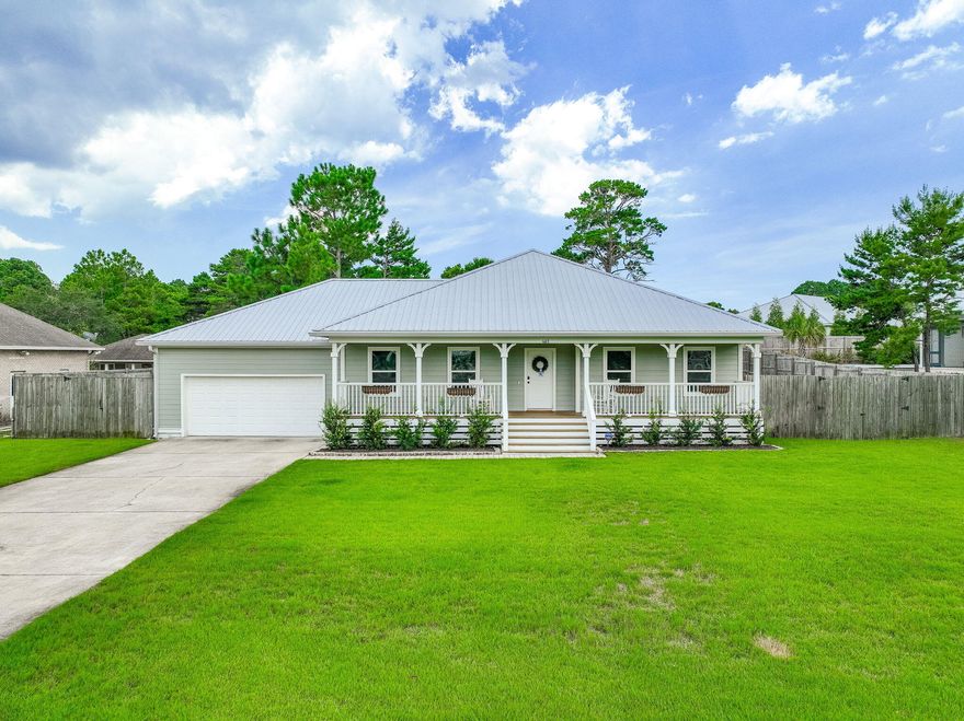 PRICE REDUCED just in time for Mother's Day! Mom will LOVE this all one level home in a quiet neighborhood only 1 mile to 30A Public Beach, 3.5 miles to Butler Elementary School and Helen McCall Park. NO HOA! Rare 2/3 acre lot, South of 98, with room for expansion, hobbies and even chickens! Easy entertaining with vaulted ceilings with beams, ceiling fans, contemporary lighting and pendent lighting over the island. From the open living/dining area, double doors lead to the primary king-size suite with a new $4000+ custom closet system. The primary bath has an extra large shower, double vanity and separate water closet. Enjoy privacy with the 2 guest bedrooms and guest bath on the opposite side of the house. There are ceiling fans in all the bedrooms, the living room and the screened porch. There is an outdoor shower located right outside the oversized garage with plenty of storage for your beach toys and a workbench for your tools. There is even a new electric car charger! 

With 2/3 acres and NO HOA, there is plenty of room for parking your boat, RV and other vehicles and adding a guest house, a pickleball court, pool, etc.  Located in beautiful South Walton near schools, the beach, golf course and the Cessna boat launch! 

Recent improvements include NEW HVAC, NEW TESLA CHARGING STATION, NEW PAINT INSIDE AND OUT, NEW SOD, NEW IRRIGATION SYSTEM, NEW GUTTERS, NEW CUSTOM CLOSET, NEW LAUNDRY ROOM ORGANIZATION SYSTEM, SINK AND COUNTERTOPS!