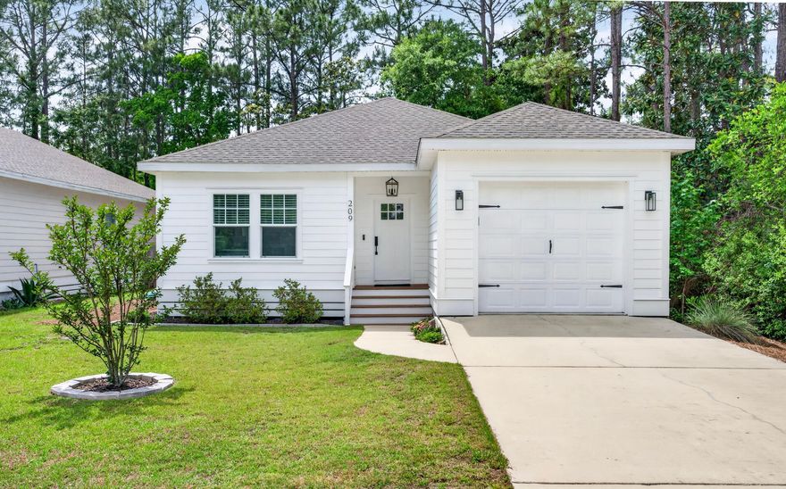 Bright, airy, newer construction coastal-inspired 3BR/2BA home in Santa Rosa Beach offering timeless finishes and upgrades throughout. 

Shiplap accents, nine-foot ceilings, and luxury vinyl plank flooring create a light and relaxed feel, while the custom floor-to-ceiling built-in bookcase with electric fireplace adds warmth and character to the living space. The kitchen features quartz countertops, marble backsplash, vent hood and custom cabinetry extended to the ceiling. Additional highlights include a one-car garage and no HOA or rental restrictions, offering added flexibility for full-time living, a second home, or investment potential. Conveniently located near Cessna Landing and just 10 minutes from 30A and Ed Walline Beach Access.