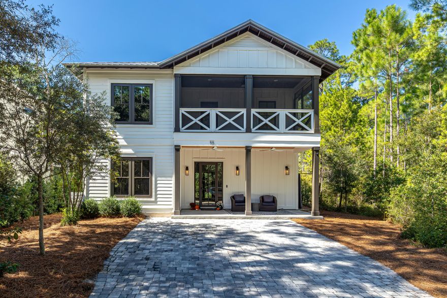 Tucked away on one of the most secluded homesites in Grayton Bayou, this beautifully built 2022 residence is surrounded by more than five acres of HOA-protected forest, offering rare privacy and a peaceful natural setting just minutes from the beaches of 30A.  

With nearly panoramic views of longleaf pines from three sides, the home is designed to live larger than its footprint. Two upper-level screened porches invite you to relax among the trees, while the expansive composite deck and covered outdoor kitchen—complete with grill and mini fridge—create a seamless indoor-outdoor lifestyle perfect for entertaining or quiet evenings under the stars.  Inside, solid construction and premium SuperHouse Miami-Dade certified windows and doors.  The light-filled main level offers tranquil forest views throughout. A flexible office/guest space with a Murphy bed, custom acoustic wood walls, and dual closets easily functions as a fourth bedroom.

Upstairs you'll find three additional bedrooms, including a serene primary suite and two guest rooms connected by a Jack-and-Jill bath.

The backyard has been thoughtfully transformed into a private tropical sanctuary, featuring over 20 mature plantings, including banana, avocado, tangerine, kumquat and evergreen trees. An outdoor shower with hot and cold water adds the perfect finishing touch after a day at the beach.

Additional features include:
" Whole-house water filtration
" Whole-house dehumidifier
" MERV-13 air filtration system
" Brick-paved streets & neighborhood pool
" Bayfront access nearby
" No short-term rentals permitted, ensuring peace and privacy

Enjoy effortless coastal living - bike to Grayton Beach in 10 minutes or Seaside in 15 - all while returning home to complete privacy, quiet, and nature.

Smartly sized. Perfectly private. Designed for coastal living.
