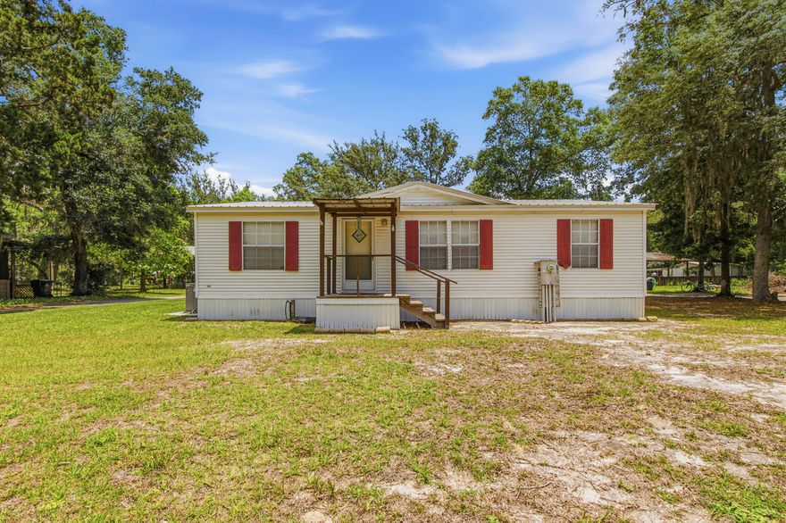 Located on McDaniel's Fish Camp Road where the bay life meets everyday comfort and peace and quiet! This 3-bedroom, 2-bathroom doublewide sits on a great quarter-acre lot just moments from Pitts Bayshore park and public boat ramp. This property gives you a gateway to waterfront views, boat launches, and lazy afternoons by the bay. Inside, the home offers luxury vinyl plank flooring, open floor plan featuring an expanded living room that opens onto a spacious screened porch. The home offers a split-bedroom floor plan offers privacy; the laundry hookups add practical convenience. South Walton coastal beaches located nearby and shopping just minutes away, this affordable home in Freeport delivers the lifestyle without the waterfront price tag. Schedule your showing today!