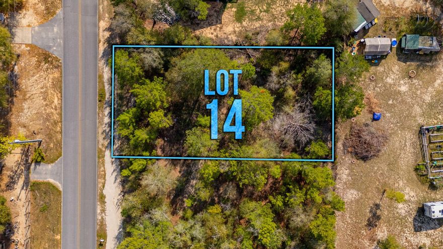 Build your future on this flat, buildable 0.23-acre lot with easy access to public water and power. Located on a county maintained paved road for convenient access. Manufactured homes are allowed and there's no HOA! The lot measures approximately 80' x 125' and will require a septic system since sewer is not available in the area. According to the Walton County GIS map, no wetlands are indicated. Additionally, lot 13 is also available for purchase. Contact us or your favorite Realtor for more information!