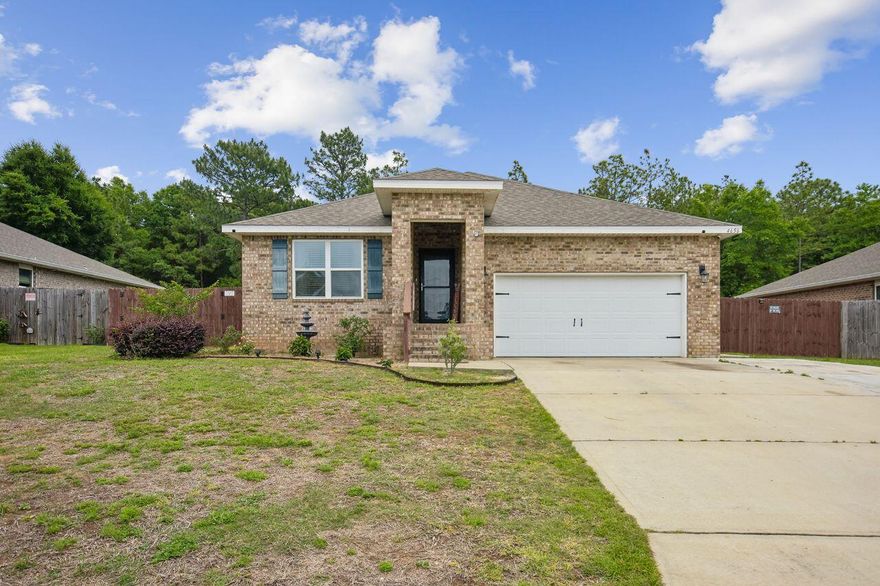 The popular Cali floor plan offers a spacious, open design perfect for entertaining and everyday living. This 4-bedroom, 2-bath home features an oversized bay 2-car garage and covered patio. The kitchen includes granite countertops, stainless steel appliances, a large island, and corner pantry. Enjoy easy-care wood-look flooring in main areas with carpet in bedrooms. The primary suite offers a double vanity, large walk-in closet, linen closet, and a 5' shower.

Recent upgrades include a gazebo/cabana, shed, screened porch, and solar panels. Additional features include hurricane fabric window protection and a Smart Home Technology system. Convenient location in East Milton with easy access to I-10. Set on a large lot, this property offers plenty of outdoor space for relaxation & recreation. Whether you're entertaining guests or simply enjoying everyday living, this Milton gem has everything you need, with enhanced comfort, style, and functionality. Call today to schedule a private tour!