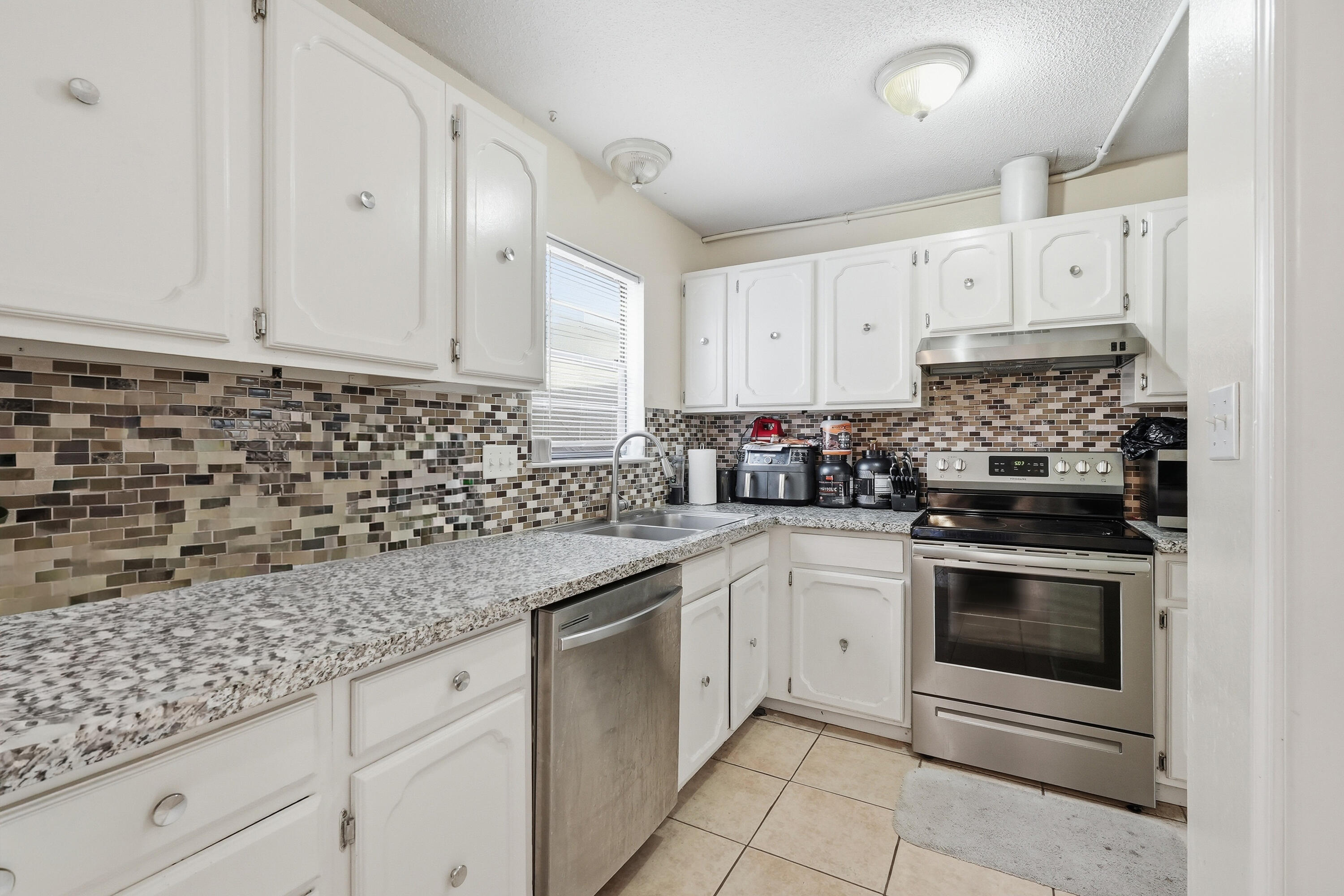 PORT DIXIE BEG NE COR BLK 56 S 164.67 FT - Residential