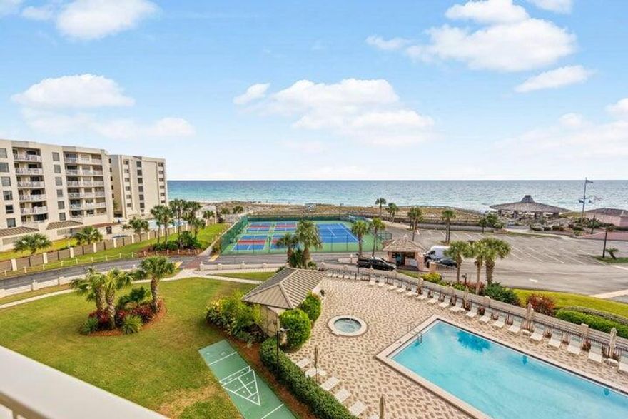 Experience coastal living at its finest in this stunning 2-bedroom Gulf view condo in the heart of Destin. Perfectly positioned to showcase unforgettable Emerald Coast sunsets, this exceptional property offers the ideal blend of relaxation, comfort, and investment potential.  Whether you're searching for a second home, vacation getaway, or income-producing property with a history of repeat guests, this condo checks every box. Inside, you'll find a spacious open layout featuring beautiful maintenance-free wood-look tile flooring throughout, creating a stylish and low-maintenance retreat.  Designed for entertaining and easy beachside living, the generous living spaces flow seamlessly onto your private balcony -- the perfect spot to unwind while enjoying panoramic Gulf views and breathtaking sunsets night after night.  This is your  opportunity to own a slice of paradise in one of Florida's most sought-after beach  destinations. This unit is truly a MUST SEE!