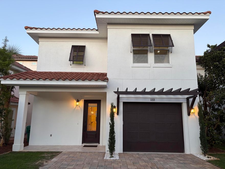 This beautifully designed Gulf Power EarthCents® certified Tuscany Coastal Home blends Mediterranean elegance with modern energy efficiency less than a mile from Destin's world-famous sugar-white beaches and emerald waters. Enjoy a healthy, active coastal lifestyle near boating, paddleboarding, golf, shopping, dining, and entertainment. Energy-saving features include a Trane 14 SEER HVAC with Nexia Home Intelligence, impact-resistant Low-E PGT windows, Frigidaire Gallery appliances, and a GE GeoSpring Hybrid water heater. Located in the gated Calusa Bay community with a resort-style pool, bathhouse, and low HOA fees of only $230 quarterly, this home is ideal as a primary residence, vacation retreat, or investment property near Destin Commons and the Emerald Coast's best attractions.