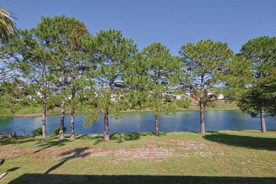 Fully furnished and rental-ready! This 2 bed, 2 bath unit features dual walk-in showers, a coffee bar, and carpet in most areas. Located in the private part of Gulf Terrace, this unit is clean, comfortable, and move-in ready and best of all has a beautiful view of the lake and green belts. Located in a well-maintained community with 3 pools, a tennis court, and grill/picnic areas—many of which have been renovated.  Just 0.5 mi to Big Kahuna's, 0.8 mi to Publix & Target, less than 1 mi to beach access, and 2 mi to Destin Commons. Great for short- or long-term stays! Buyer to verify all measurements and pertinent information. Schedule your private showing today.