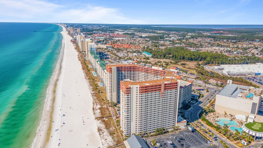 Experience breathtaking Gulf views and unforgettable sunsets from this beautifully maintained 19th-floor condo in the highly desirable Shores of Panama. Perfectly positioned in the center of the building, this southern-facing unit offers unobstructed panoramic views overlooking the resort's iconic lagoon-style pool and the emerald waters of the Gulf of Mexico.

This spacious residence features a true 2-bedroom, 2-full-bath layout with an open and airy floor plan designed for comfort and coastal living. Tile flooring enhances the main living areas, while the expansive private balcony provides the ideal setting to relax, dine, or take in the spectacular sunset skies. The kitchen is well-appointed with granite countertops, modern appliances, and a functional layout ideal for entertainingBoth bedrooms enjoy private full bathrooms, and the unit is complete with a full-size stacked washer and dryer for added convenience.

Whether you're seeking a primary residence, second home, or investment opportunity, this Gulf-front condo delivers space, views, and the resort lifestyle Shores of Panama is known for.