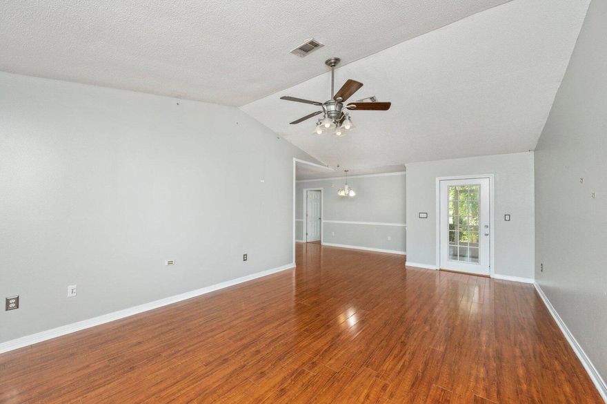 Adorable, move-in-ready home tucked in a cul-de-sac in South Crestview! Perfectly located for those needing a short commute to Duke Field and Eglin military bases, this home is big on living! Step inside to discover an open and inviting living space with soaring high ceilings that create a bright and airy atmosphere. Hard floors, and tile, and a great layout. The kitchen boasts updates, stylish finishes, and plenty of counter space for all your culinary needs. Offering three spacious bedrooms and two bathrooms, with a split floorplan. The large backyard is a true gem, with screen porch and privacy. The backyard also includes a handy storage shed for all your tools and equipment, keeping your outdoor area organized and clutter-free.Additional features of the home include a one-car garage, perfect for parking or extra storage, and a location that's hard to beat. Roof is metal.  Seller will replace water heater with acceptable offer.  HVAC is 2021