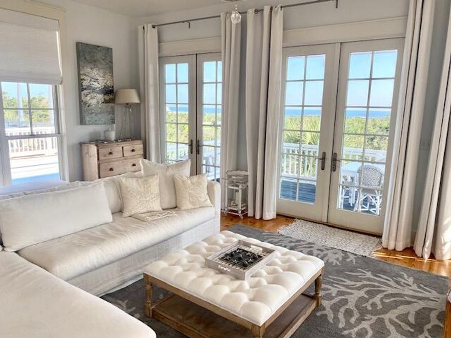 A truly exceptional home with views of the Gulf of America offered for a long-term rental lease. This fully furnished beach home with a private elevator, and beautifully decorated french-inspired furnishings has been featured in coastal magazines. Upon entering on the first level, you'll find a custom built-in queen sized bunk room with a large bathroom, farmhouse sink, and huge shower. As well as a laundry room, owners closet, patio and 2 car garage. As you take the private elevator or stairs to the second floor, you will find 3 generous sized bedrooms with ensuite baths, including the primary suite, and a quaint office nook. Through the windows of the 2 guest bedrooms, you'll see the lily pads on Cypress Pond. The primary suite is a romantic setting with gorgeous views of Topsail Reserve from the covered patio. The ensuite bathroom has a clawfoot tub, two separate vanities, built-in closets, and large private shower. As you head upstairs to the third floor, you will be inspired by the incredible Gulf views and the attention to detail in the kitchen, dining room and 2 living areas. The kitchen has high-end Viking appliances, an expansive kitchen island, and spacious dining room for entertaining. The sitting room off the kitchen area, gives you space to relax and watch TV or read a book. In the spacious great room, you can cozy up on the large sectional sofa and enjoy the warm fireplace. On the balcony, there are 2 porch swings and a dining table, which allow you to take full advantage of both the sunset and sunrise views. Cypress Dunes is a gated community that is surrounded by Topsail Hill State Park, with amenities that include tennis/pickle-ball court, pool and spa, exercise gym, clubhouse, trees and green space, ponds, and walking bridges. The nearest beach access is just down 30A at Topsail Hill State Park next door or the nearby Dune Allen public beaches. Enjoy the quieter side of 30A and nearby restaurants like Stinky's, 3 Sons BBQ, and Vue on 30A.