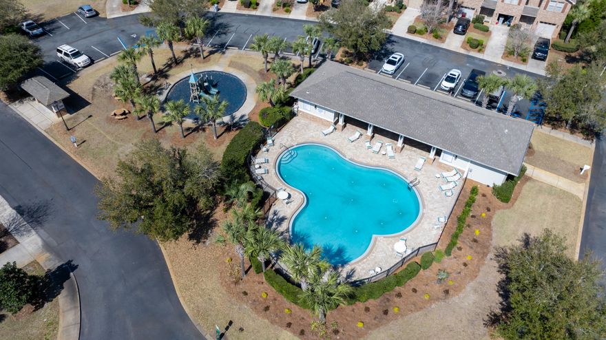 *Presented with staging furniture* Welcome to 8808 Brown Pelican Circle in Navarre, Florida, a beautifully maintained townhome located in the highly sought-after Reserve Pointe community. Perfectly positioned just 4 miles from the white sands of Navarre Beach, approximately 13 miles to Hurlburt Field, and about 36 miles to Pensacola Beach, this home offers the ideal blend of convenience and coastal living.
Reserve Pointe is known for its lifestyle-focused amenities, including a resort-style swimming pool, playground, and professionally maintained landscaping, creating a welcoming environment for residents and guests alike.

Inside, you'll find durable wood-look vinyl flooring throughout the main level, combining style and functionality. The kitchen is thoughtfully designed with stainless s teel appliances, granite countertops, a modern backsplash, and rich cabinetry, offering both elegance and everyday practicality. The open-concept layout provides a bright and inviting living and dining space, perfect for entertaining or relaxing at home. A convenient half bath is also located on the first floor.

Upstairs, the spacious primary suite serves as a private retreat, featuring an en-suite bathroom with double vanities, granite countertops, and a walk-in shower. Two additional bedrooms are serviced by a second full bathroom with a shower/tub combination, offering flexibility for guests, family, or a home office setup.

Step outside to enjoy a fully fenced backyard accented by a tropical palm tree, creating a private and relaxing outdoor space.
