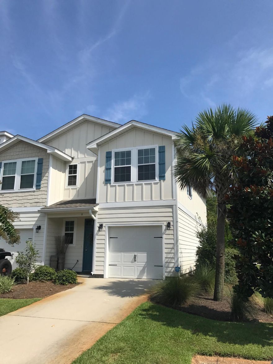 End-unit townhome with abundant natural light and added privacy. Former model home with some of the community's best upgrades, including granite countertops, crown molding, extra lighting, and beautiful 5-inch hardwood floors throughout the first floor. Entire AC system was recently replaced.