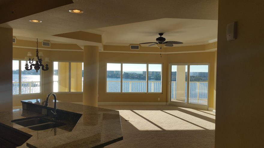 Available July 1. unfurnished, Awesome views of the Sound and the Gulf. Upper floor unit. See both the sunrise and sunset from a great floor plan. Excellent condition. 3 Bedrooms, 3 full baths large porch balcony. Luxury amenities, pool, spa, fitness room, theater room, covered parking, two elevators, boat docks, security. This location has it all. Vacancies are rare. Water, sewer, basic cable, up-graded internet service are all provided with the rent. Tenant pays for electric service only.   All floors are hardwood or tile.  Unit is rented UNFURNISHED, some of the pictures show present tenant furniture.