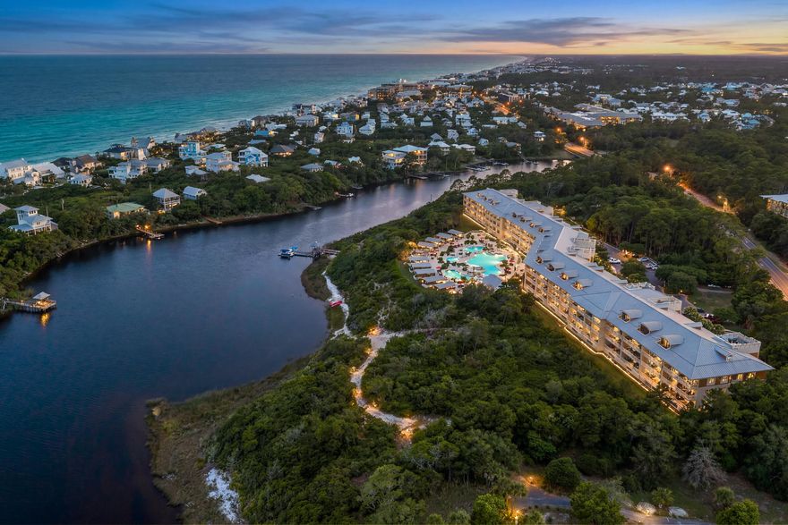 Experience coastal living on 30A at its finest in this RECENTLY RENOVATED 3BR/3.5BA retreat in the sought-after Sanctuary at Redfish. Offered furnished, this residence is move-in ready and designed for effortless luxury living.  Enjoy the resort-style pool and hot tubs surrounded by firepits, gas grills, and lush landscaping, or paddle across Big Redfish Lake, launch your canoe, or take the pontoon shuttle straight to the secluded beach. Inside, you'll find 10' ceilings, a gas fireplace, quartz finishes, and expansive balconies with breathtaking views. A private poolside CABANA--one of only ten in the community--is also available for purchase for $250,000, offering the perfect space for entertaining, relaxing, or storing all your beach essentials.