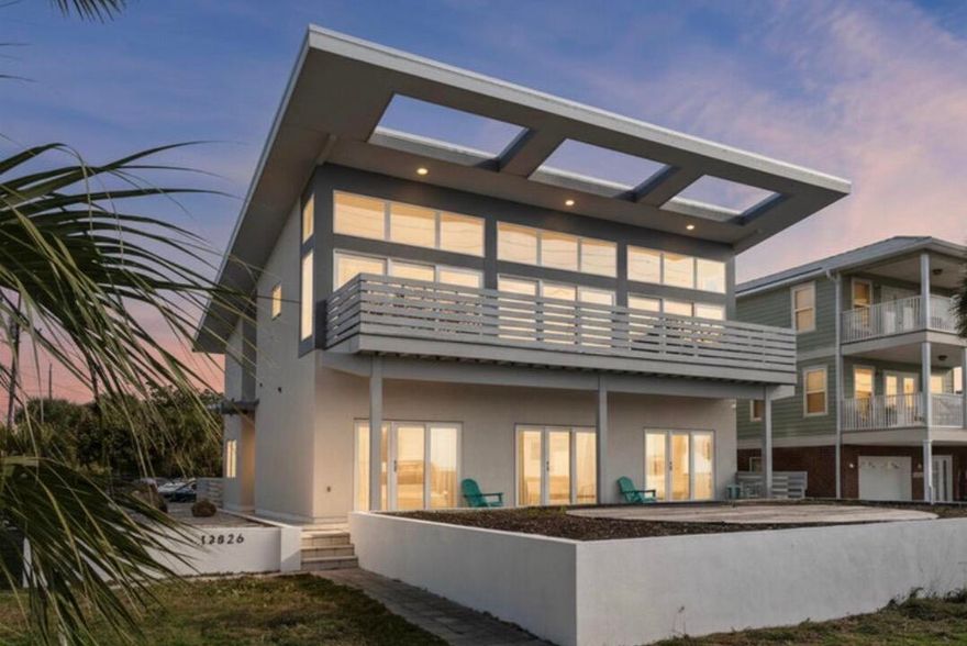 FOREVER GULF VIEWS and true beachfront bliss await in this one-of-a-kind, custom-built modern beach home in Panama City Beach. 

Designed to capture breathtaking, unobstructed water views, this stunning property showcases the sparkling Gulf from nearly every room.

Expansive windows flood the home with natural light, while the spacious porch and multiple outdoor living areas create the perfect setting for seamless indoor-outdoor entertaining. Wake up to the soothing sound of waves and enjoy sun-drenched interiors in the open-concept living space--ideal for both relaxing and gathering with family and friends.

Step onto the balcony to experience the fresh coastal air and unforgettable sunsets over the water.  With its distinctive design and serene beachfront setting, this home embodies the ultimate coastal lifestyle.

Currently operating as a successful vacation rental, the property comfortably sleeps 12 and features 6 spacious bedrooms, 6 full bathrooms, a private pool, and direct private beach access to the sugar-white sands and emerald-green waters of the Gulf. This is an exceptional investment opportunity, second home, or primary residence. Experience the best of the Emerald Coast lifestyle in the heart of PCB!

Buyer to verify all dimensions, fees & written information.