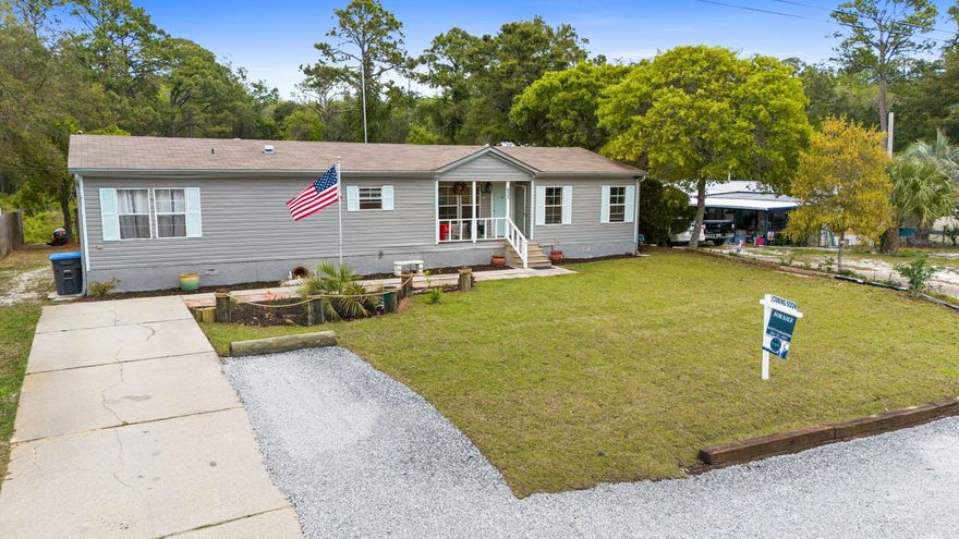 This updated 3BR/2BA home is located in the West End of Panama City Beach, in the Laguna Beach area, just 6 blocks from the white sandy beaches and minutes from shopping and dining. Situated on an ideal quarter-acre lot, the property offers ample outdoor space and privacy, and is perfect for building your dream home or enjoying as-is. Recent improvements include an HVAC system, septic tank, LVP flooring and high-traffic carpet, new toilets and vanities, fresh interior paint, roof replacement, and PEX plumbing, providing added value and peace of mind for the next owner. The spacious backyard features a generous workshop and a covered deck with granite countertops--perfect for outdoor entertaining, storage, or additional prep space for grilling and cooking. Constructed for durability, the home is securely strapped to concrete runners and rated to withstand winds up to 145 MPH.

A rare opportunity in a prime coastal location--schedule your showing today.