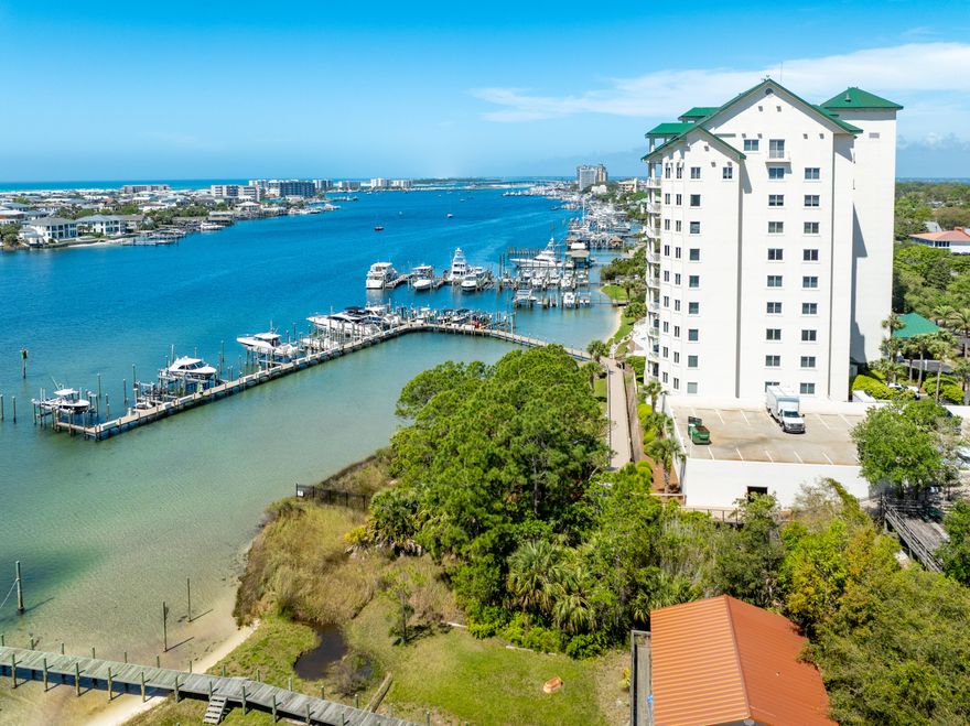 ASSUMABLE V.A. LOAN at 2.75% (restrictions apply and a buyer must be eligible and qualified; buyer must verify with V.A. mortgage lender Licensed in the State of Florida).  Grand Harbor represents one of the most exclusive addresses on the scenic harbor of Destin, Florida.  This 5th floor villa offers an extraordinary view corridor (enjoyed throughout much of the interior, as well as from its expansive balcony oriented to the West) to the Gulf of America, as well as the East Pass and Choctawhatchee Bay.  This premier 4-bedroom, 4- bathroom, approximate 2,995 square feet lives more like a house floor plan and less like a condominium, yet the ownership has the luxury of onsite maintenance and management to focus their well-deserved time enjoying the phenomenal local lifestyle, and perhaps... peace of mind amid periods of travel.  The amenities of Grand Harbor include a garage, guest suite, and a gorgeous club room, as well as a pool, hot tub, and other desirable exterior features, most all of which have been updated within recent years.  The delineated dog park, exclusive to ownership, is also an exceptional asset to enjoy with your dog around the tranquil harbor setting of Grand Harbor.  Please inquire for further details.