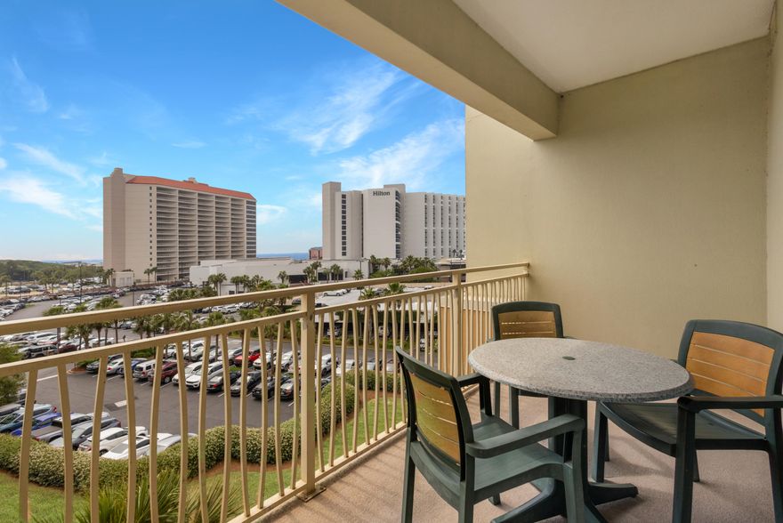 Spacious 3rd floor beachside retreat is located in Luau II on Sandestin Golf & Beach Resort. Available for a 6 month lease - fully furnished and all utilities included! This home offers an open-concept floor plan with generous living space.  The private balcony boasts easterly views of the Gulf shoreline and beyond. The master bedroom has a king-sized bed, and the living room includes a sleeper sofa for added convenience. Luau residents enjoy garage parking and a private pool complex with loungers, a grotto waterfall, and a seasonal Tiki Bar. Beach access and tunnel under Hwy 98 for walking and biking to activities on the bay side of the resort!