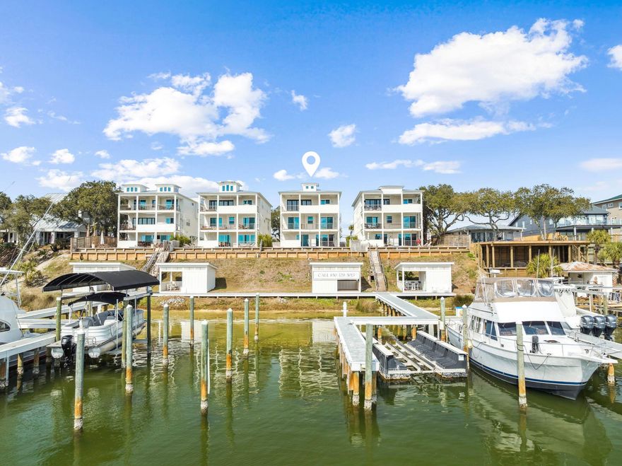 SELLER FINANCING AVAILABLE! Welcome to The Retreat at Old Pass, Destin's newest luxury waterfront enclave consisting of 4 new homes strategically placed along the shores of the Destin Harbor. Live the waterfront lifestyle with multiple deep water slip options available per owner on the 2 private docks. Enjoy spectacular views of the Destin Harbor plus Gulf views from the upper floors of the homes. Each home was thoughtfully designed to accommodate the owner and their guests with a multitude of bedrooms and entertainment areas. The first floor consists of 2 single stall garages, rec room, bedroom with en-suite bath, bunk room with bath, elevator, and powder room. The first floor blends seamlessly with the backyard outdoor space consisting of pool, spa, grill area and covered patio. The second floor is comprised of the waterfront Primary Bedroom complete with fireplace and viewing deck, an additional waterfront guest room with en-suite bath and deck, 2 additional guest rooms with shared bath, laundry room, elevator, and "meditation" room. Arriving at the top level you will find the open floor plan living/kitchen/dining combo with spectacular water views flowing out to the 3rd floor outdoor living space deck and outdoor kitchen. The kitchen is well appointed with Viking appliances and walk-in pantry. You will also find 2 additional bedrooms on this floor plus the elevator. Perfectly positioned on the Destin Harbor, this property offers easy access to restaurants and shops just a short stroll away. Bring the big boats with the deep water and accommodating dock setup where you will be just minutes from the Destin pass for offshore fishing. Live the true waterfront lifestyle just minutes from Crab Island and everything the harbor has to offer!