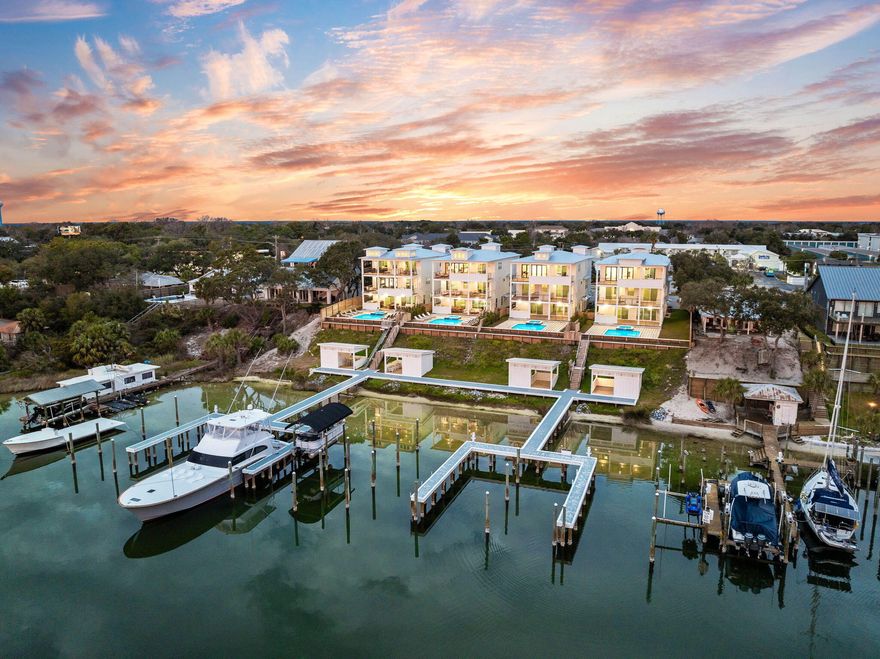 SELLER FINANCING AVAILABLE! Welcome to The Retreat at Old Pass, Destin's newest luxury waterfront enclave consisting of 4 new homes strategically placed along the shores of the Destin Harbor. Live the waterfront lifestyle with multiple deep water slip options available per owner on the 2 private docks. Enjoy spectacular views of the Destin Harbor plus Gulf views from the upper floors of the homes. Each home was thoughtfully designed to accommodate the owner and their guests with a multitude of bedrooms and entertainment areas. The first floor consists of 2 single stall garages, rec room, bedroom with en-suite bath, bunk room with bath, elevator, and powder room. The first floor blends seamlessly with the backyard outdoor space consisting of pool, spa, grill area and covered patio. The second floor is comprised of the waterfront Primary Bedroom complete with fireplace and viewing deck, an additional waterfront guest room with en-suite bath and deck, 2 additional guest rooms with shared bath, laundry room, elevator, and "meditation" room. Arriving at the top level you will find the open floor plan living/kitchen/dining combo with spectacular water views flowing out to the 3rd floor outdoor living space deck and outdoor kitchen. The kitchen is well appointed with Viking appliances and walk-in pantry. You will also find 2 additional bedrooms on this floor plus the elevator. Perfectly positioned on the Destin Harbor, this property offers easy access to restaurants and shops just a short stroll away. Bring the big boats with the deep water and accommodating dock setup where you will be just minutes from the Destin pass for offshore fishing. Live the true waterfront lifestyle just minutes from Crab Island and everything the harbor has to offer!